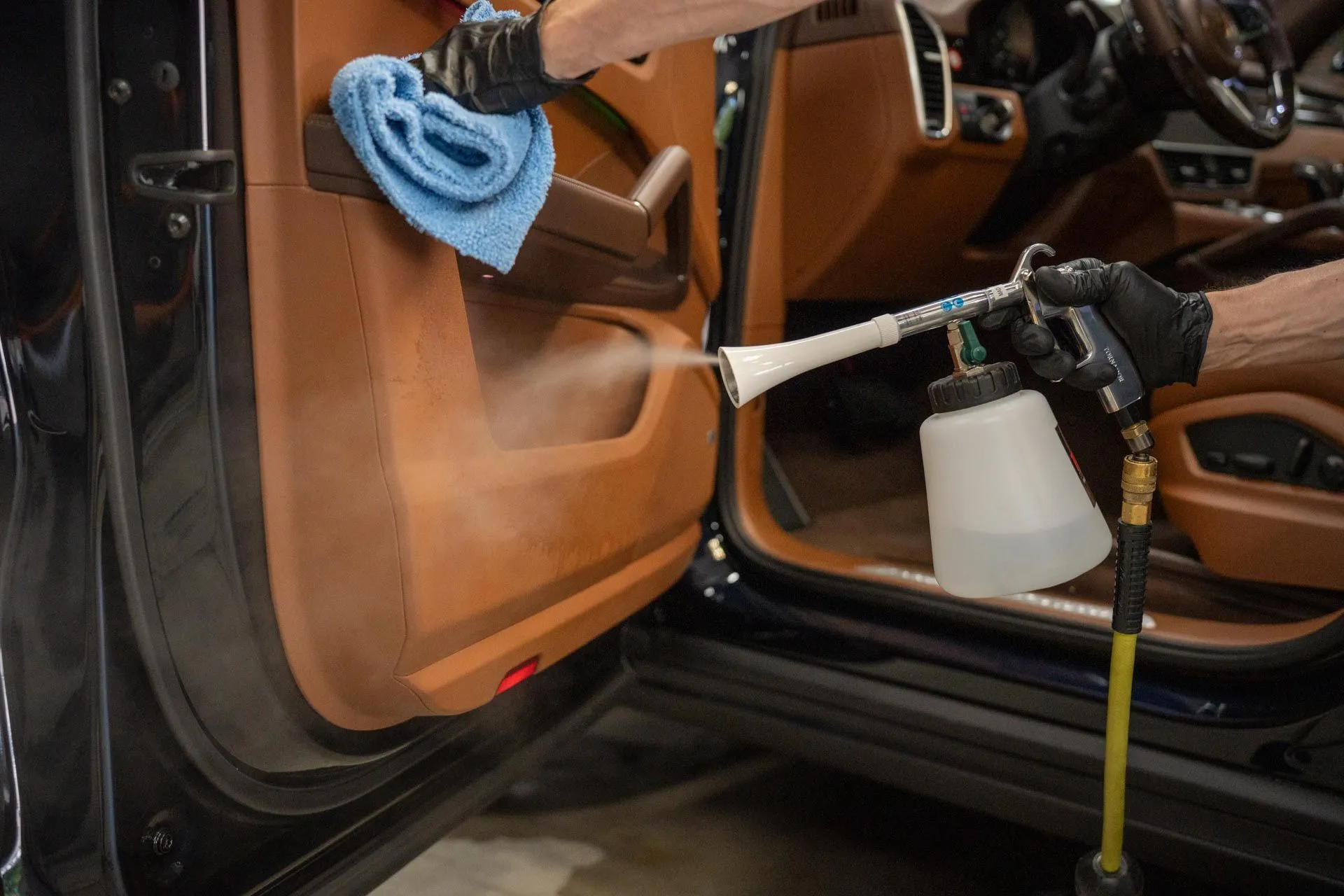 Steam cleaning a leather door panel