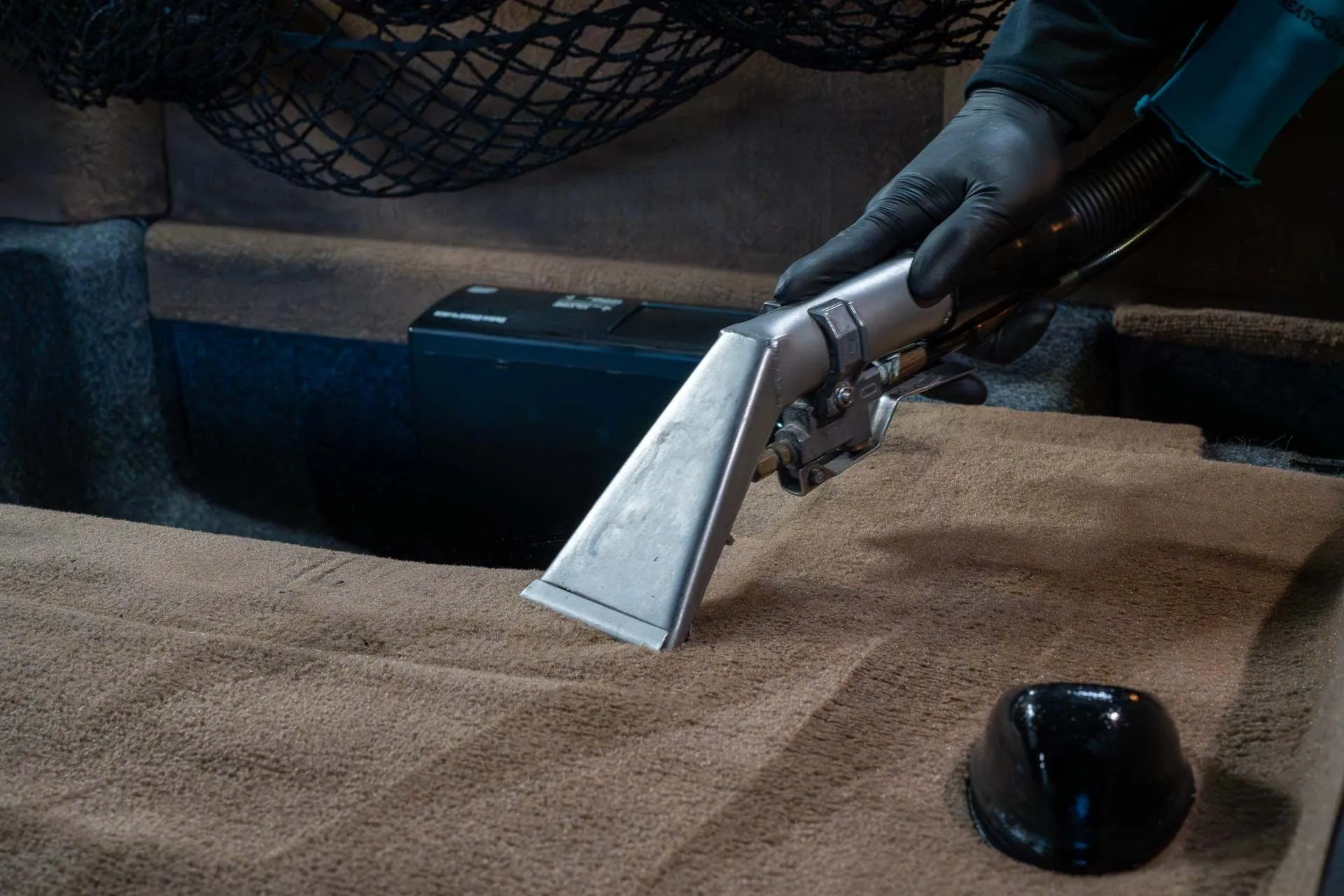 Vacuuming loose debris out of carpet