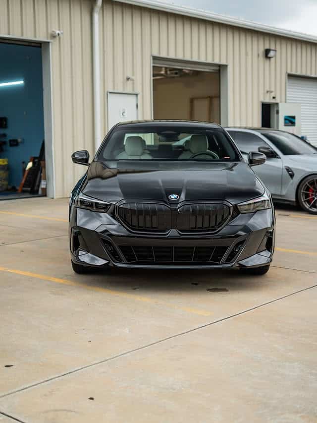 Front view of a black BMW 5 Series